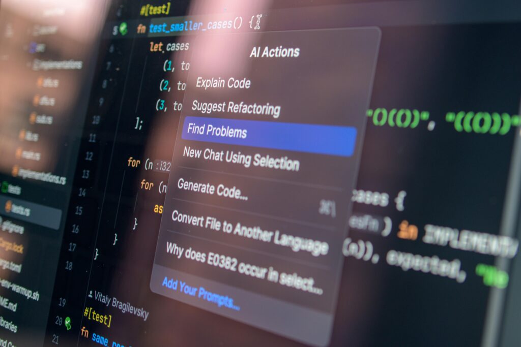 Close-up of a screen showing AI codes and actions
